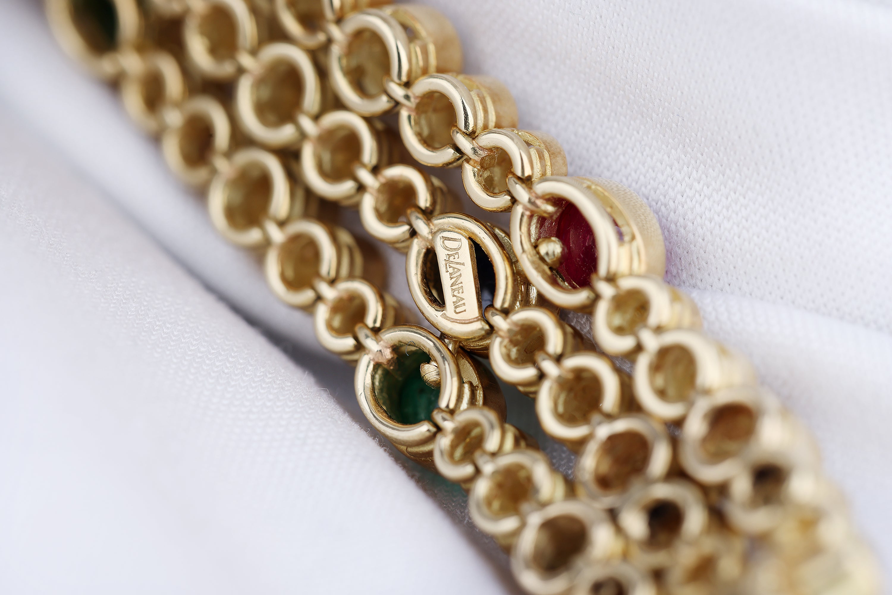 DeLaneau 1990's Ladies Wristwatch | Pavé Diamonds & Multi Gemstones | Ruby, Emerald & Sapphire Cabochons | 18k Yellow Gold
