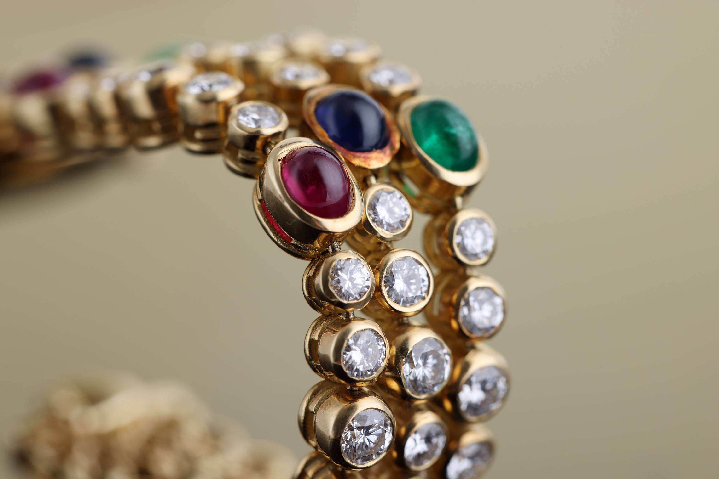 DeLaneau 1990's Ladies Wristwatch | Pavé Diamonds & Multi Gemstones | Ruby, Emerald & Sapphire Cabochons | 18k Yellow Gold