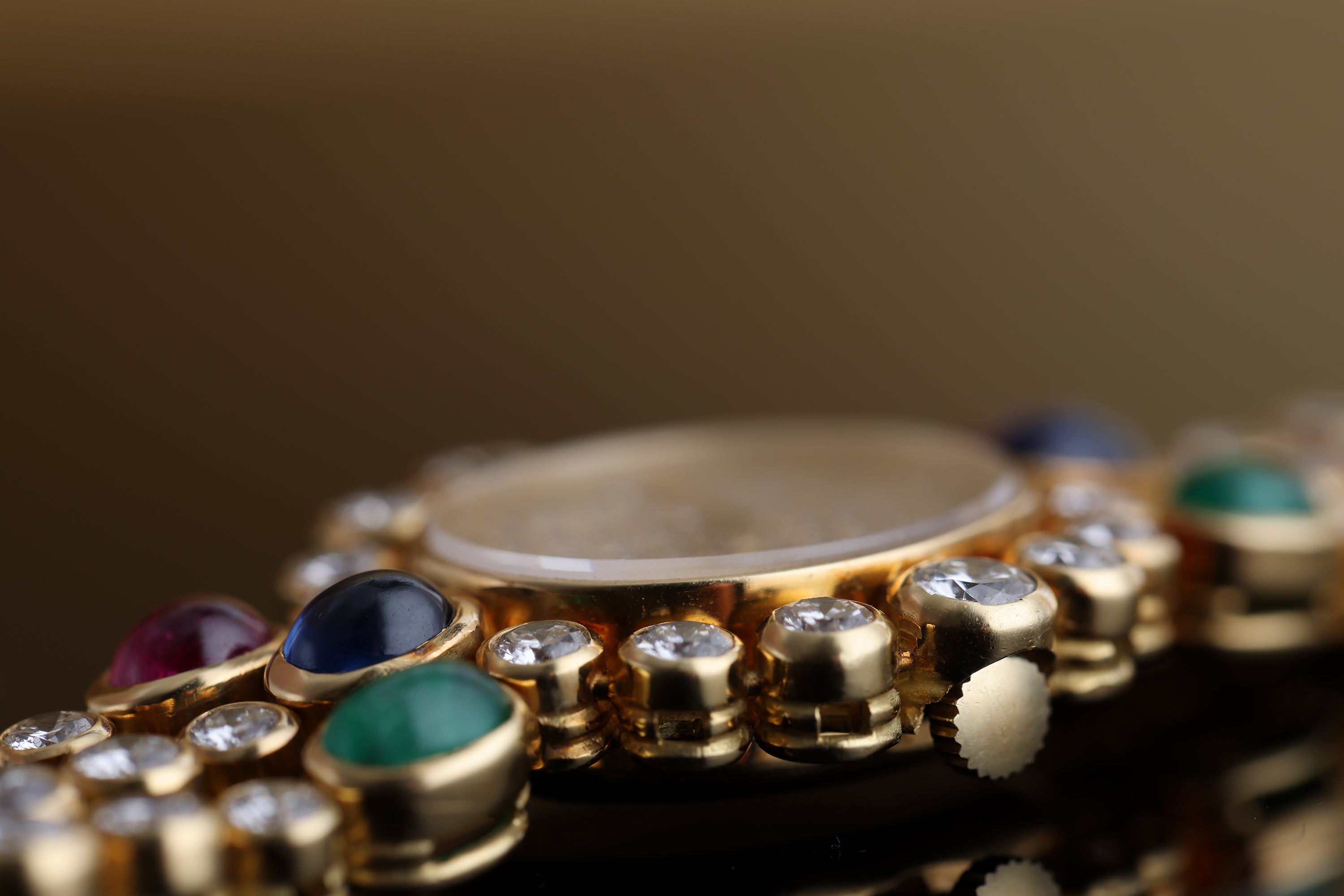 DeLaneau 1990's Ladies Wristwatch | Pavé Diamonds & Multi Gemstones | Ruby, Emerald & Sapphire Cabochons | 18k Yellow Gold
