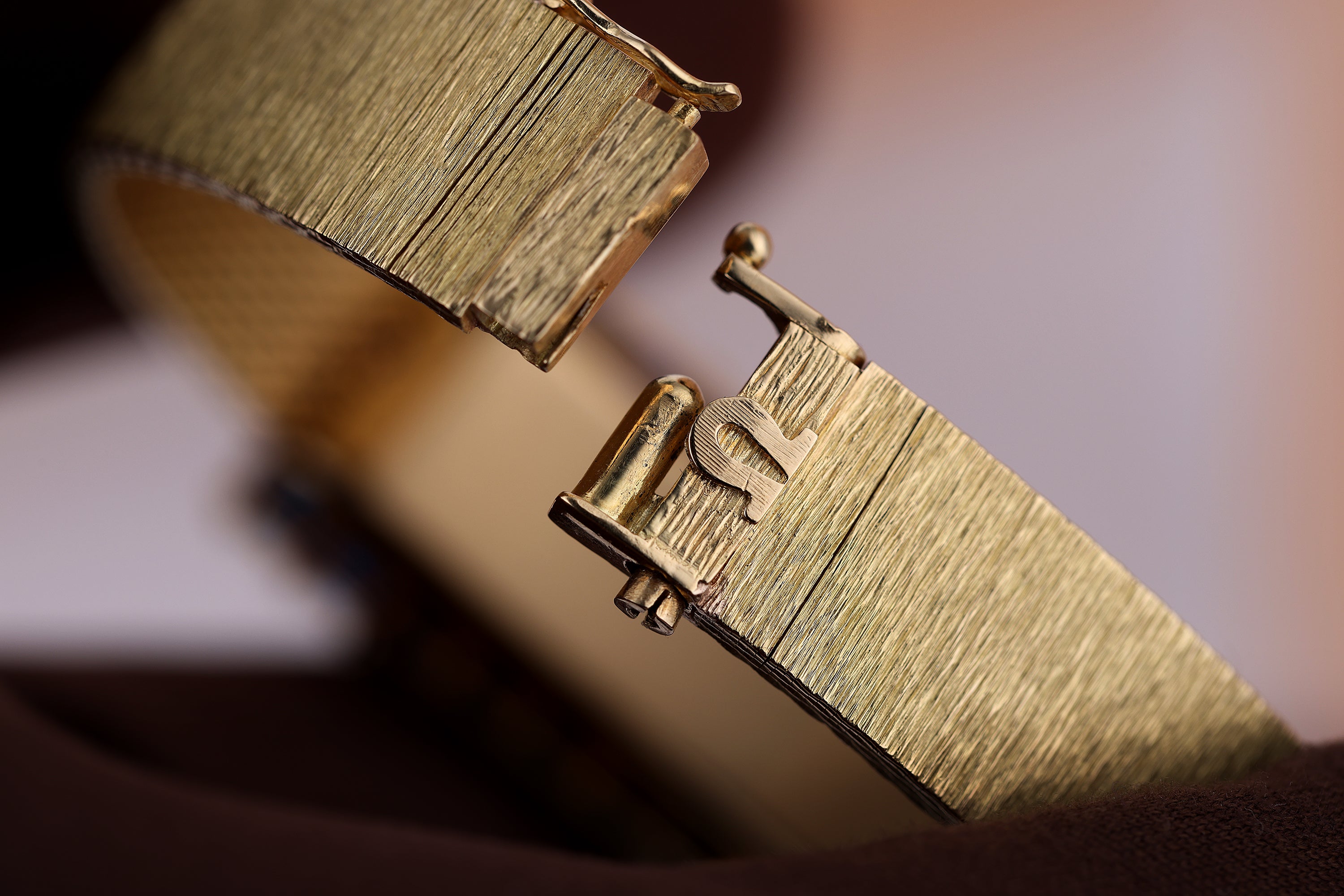 Rare Omega 1970s Wristwatch | Blue Sapphire Bezel | 17.5 x 45mm | 18k Yellow Gold | Manual Wind