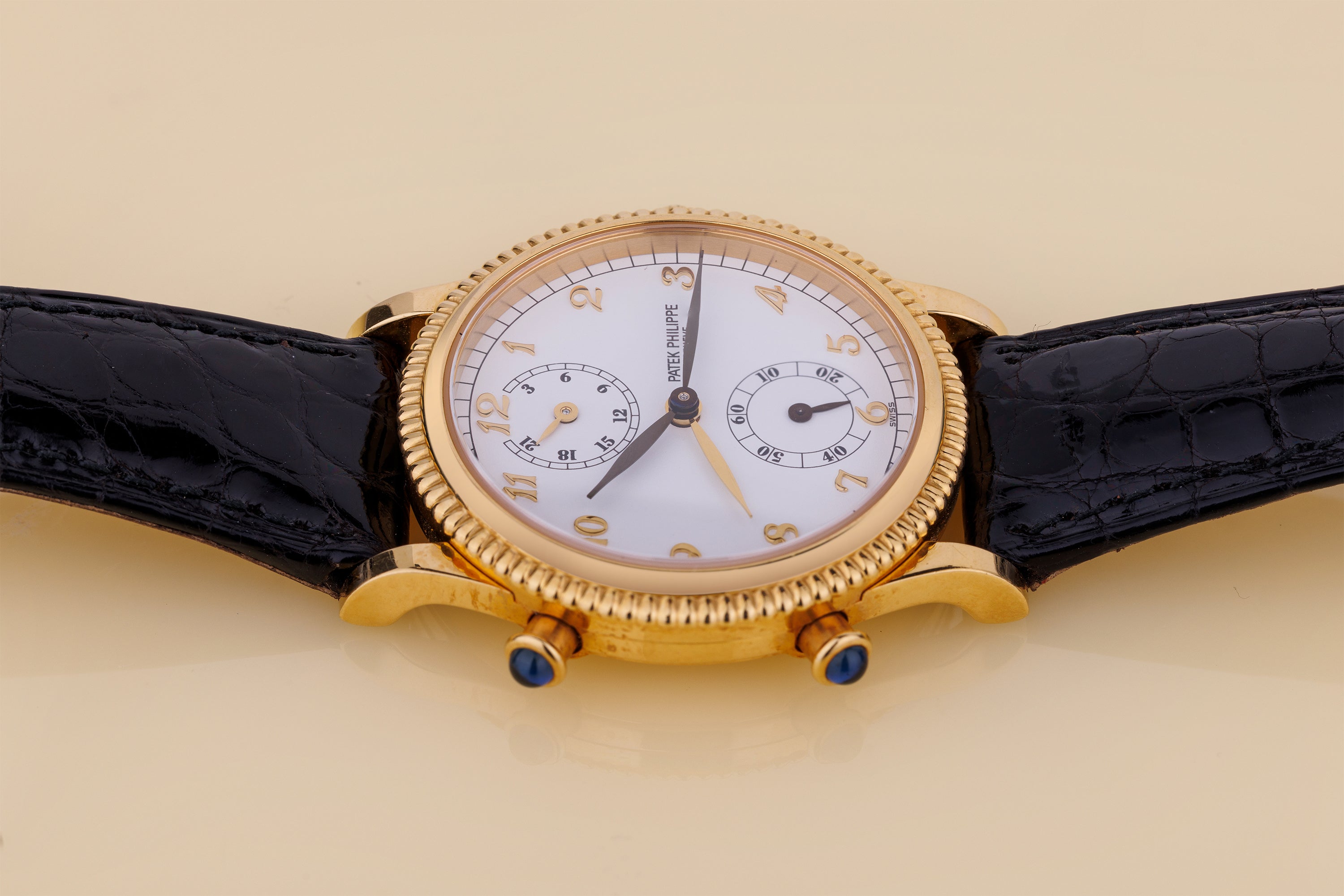 Patek Philippe Calatrava Travel Time | REF. 4864 | 18k Yellow Gold | White Dial | 29mm | Manual Wind | 1990s