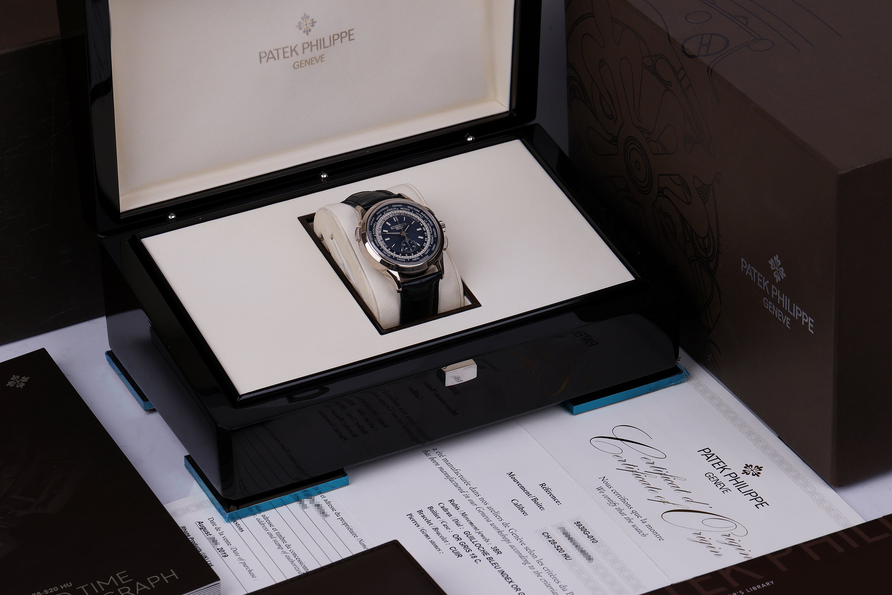 Patek Philippe World Time Flyback Chronograph | REF. 5930G-010 | 18k White Gold | 39.5mm | Box & Papers | 2019
