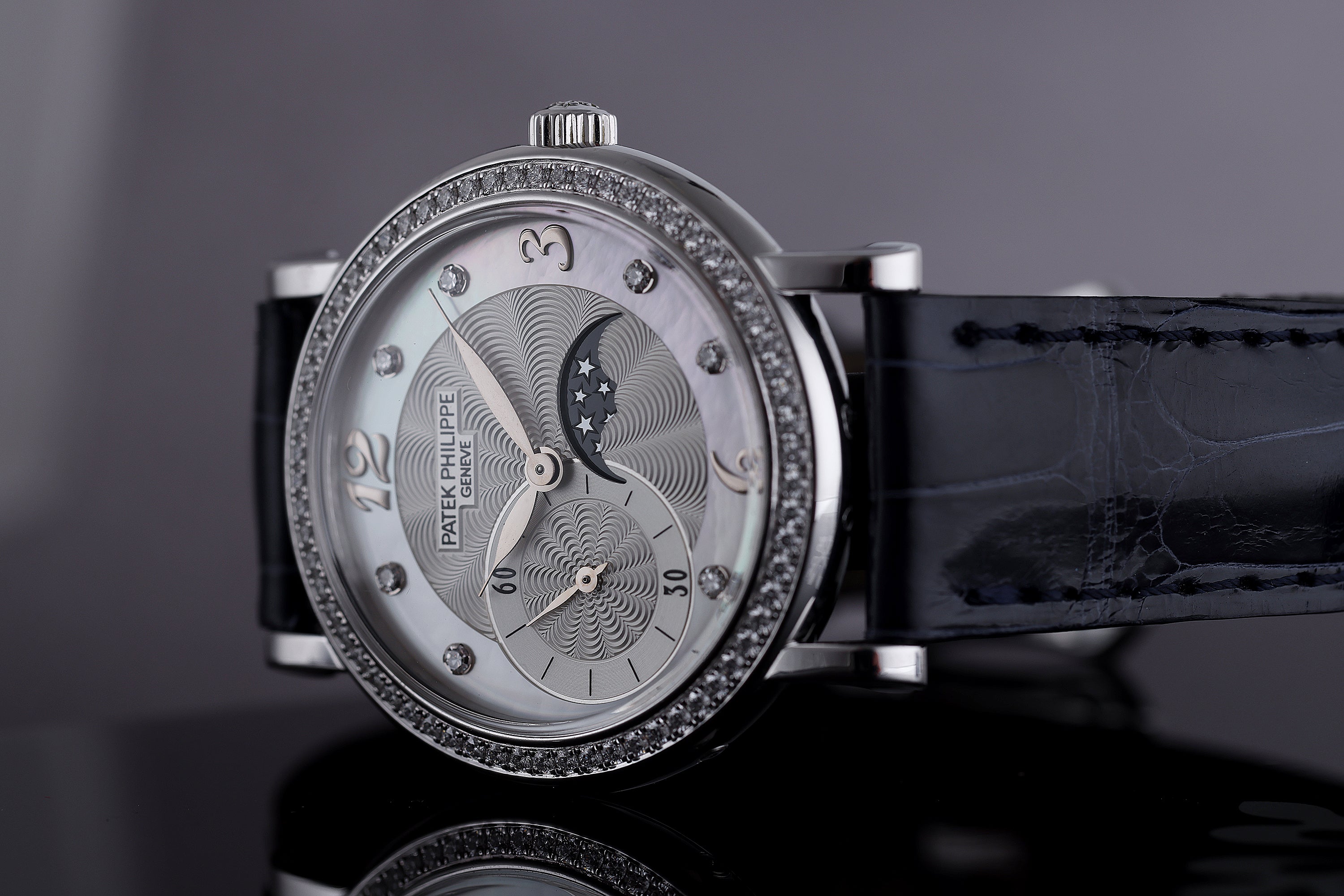 Patek Philippe Ladies Complications Moonphase | REF. 4958G | Diamond Hours & Bezel | Mother of Pearl Dial | 31mm | 18k White Gold | 2010's