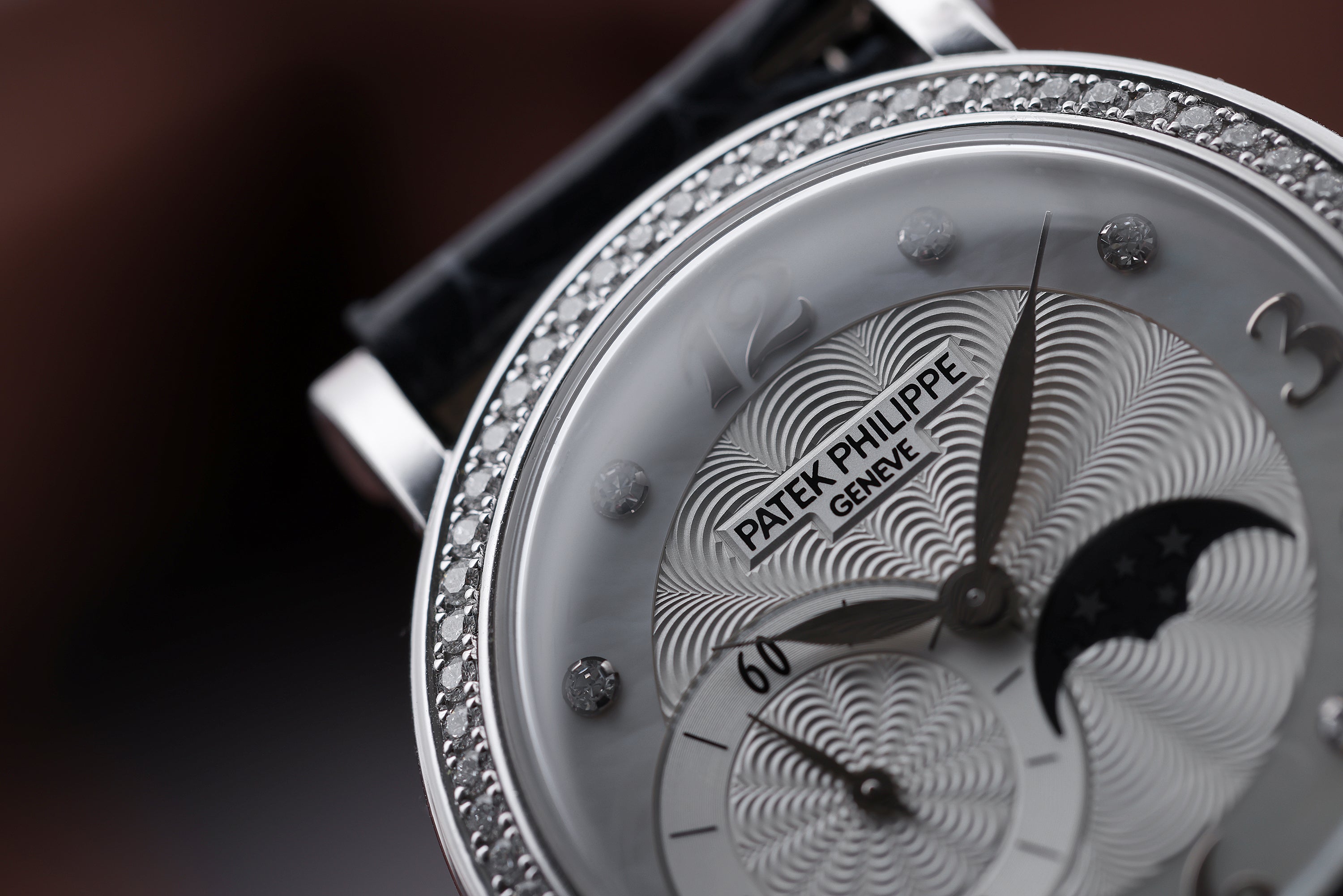 Patek Philippe Ladies Complications Moonphase | REF. 4958G | Diamond Hours & Bezel | Mother of Pearl Dial | 31mm | 18k White Gold | 2010's