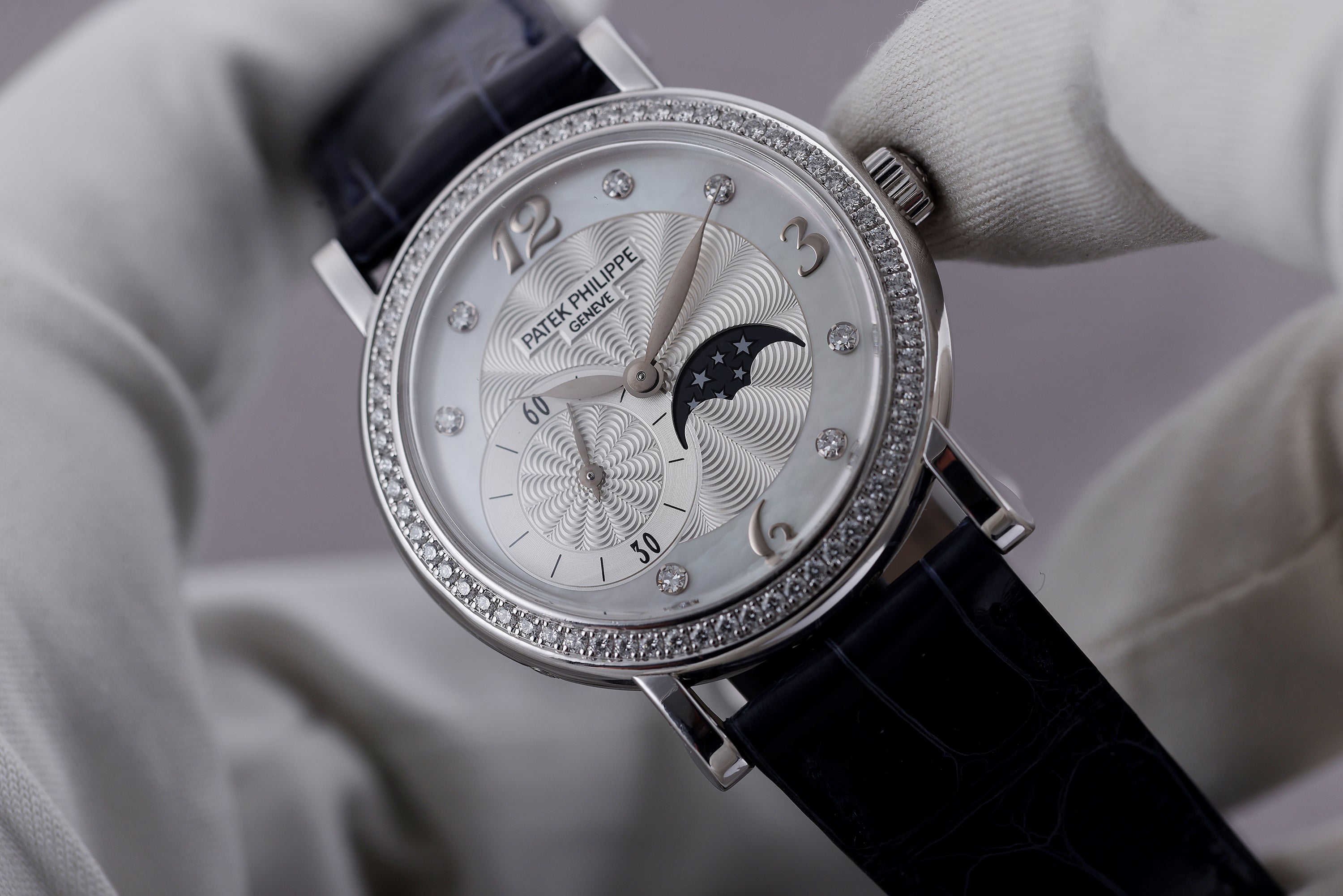 Patek Philippe Ladies Complications Moonphase | REF. 4958G | Diamond Hours & Bezel | Mother of Pearl Dial | 31mm | 18k White Gold | 2010's