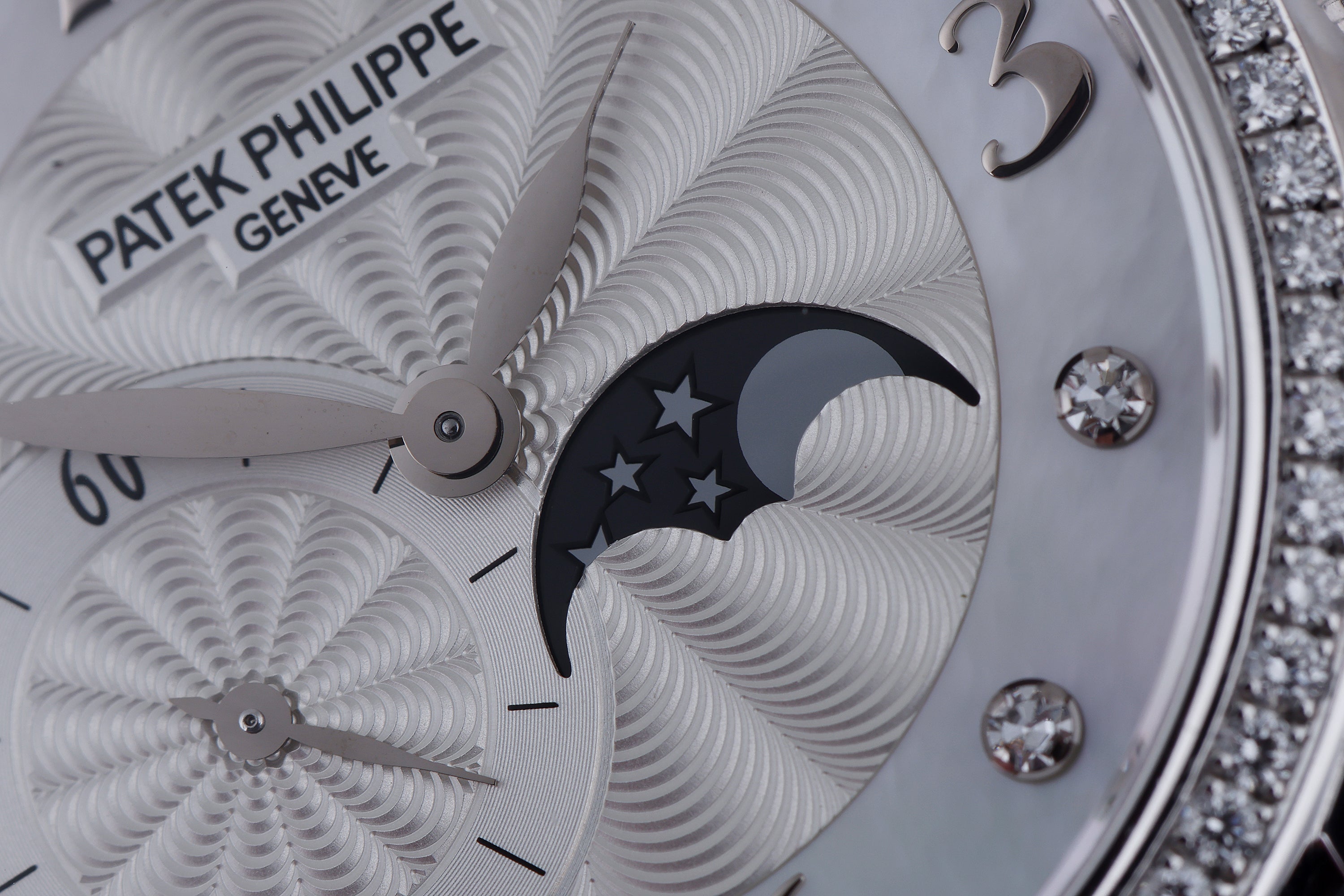 Patek Philippe Ladies Complications Moonphase | REF. 4958G | Diamond Hours & Bezel | Mother of Pearl Dial | 31mm | 18k White Gold | 2010's