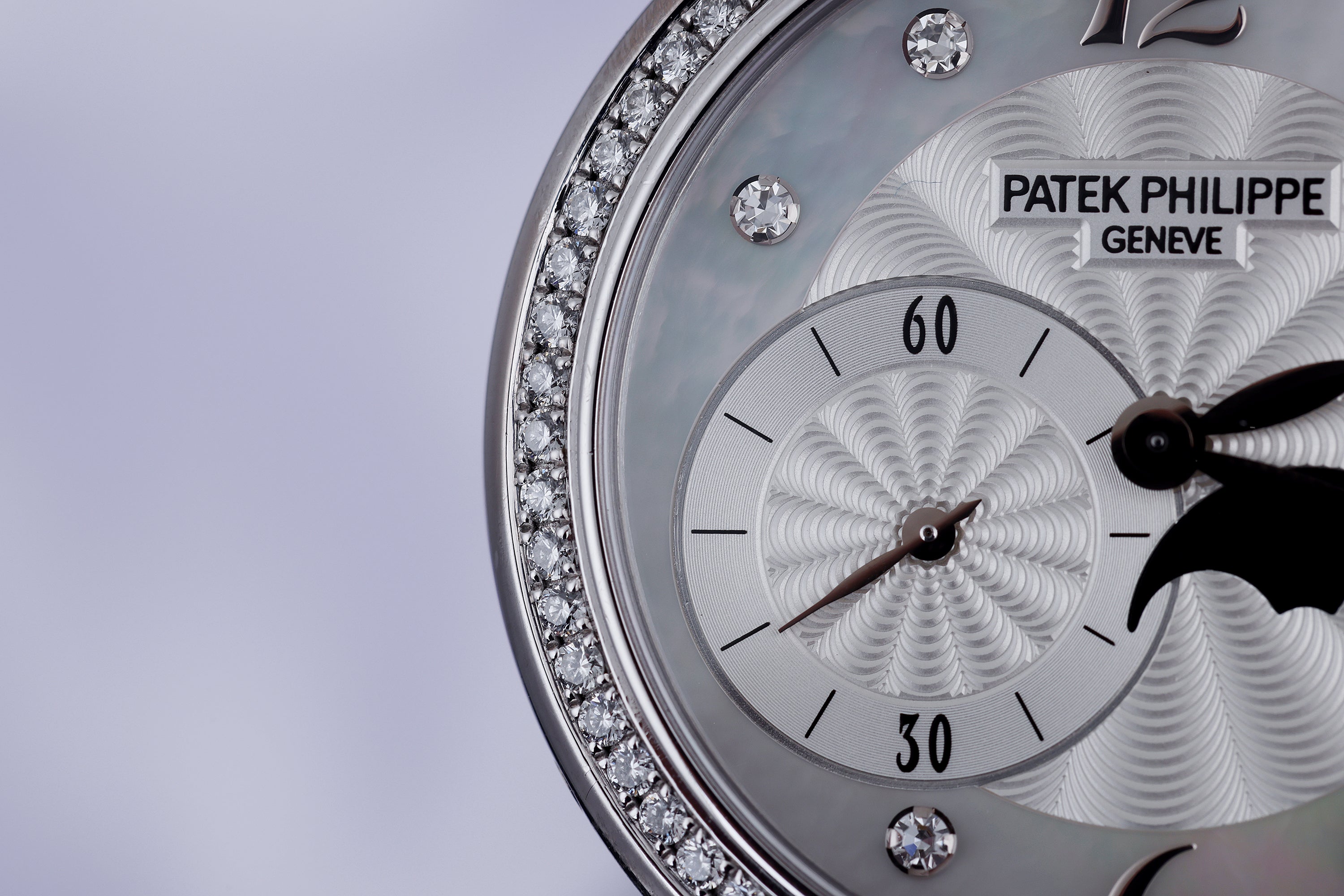 Patek Philippe Ladies Complications Moonphase | REF. 4958G | Diamond Hours & Bezel | Mother of Pearl Dial | 31mm | 18k White Gold | 2010's