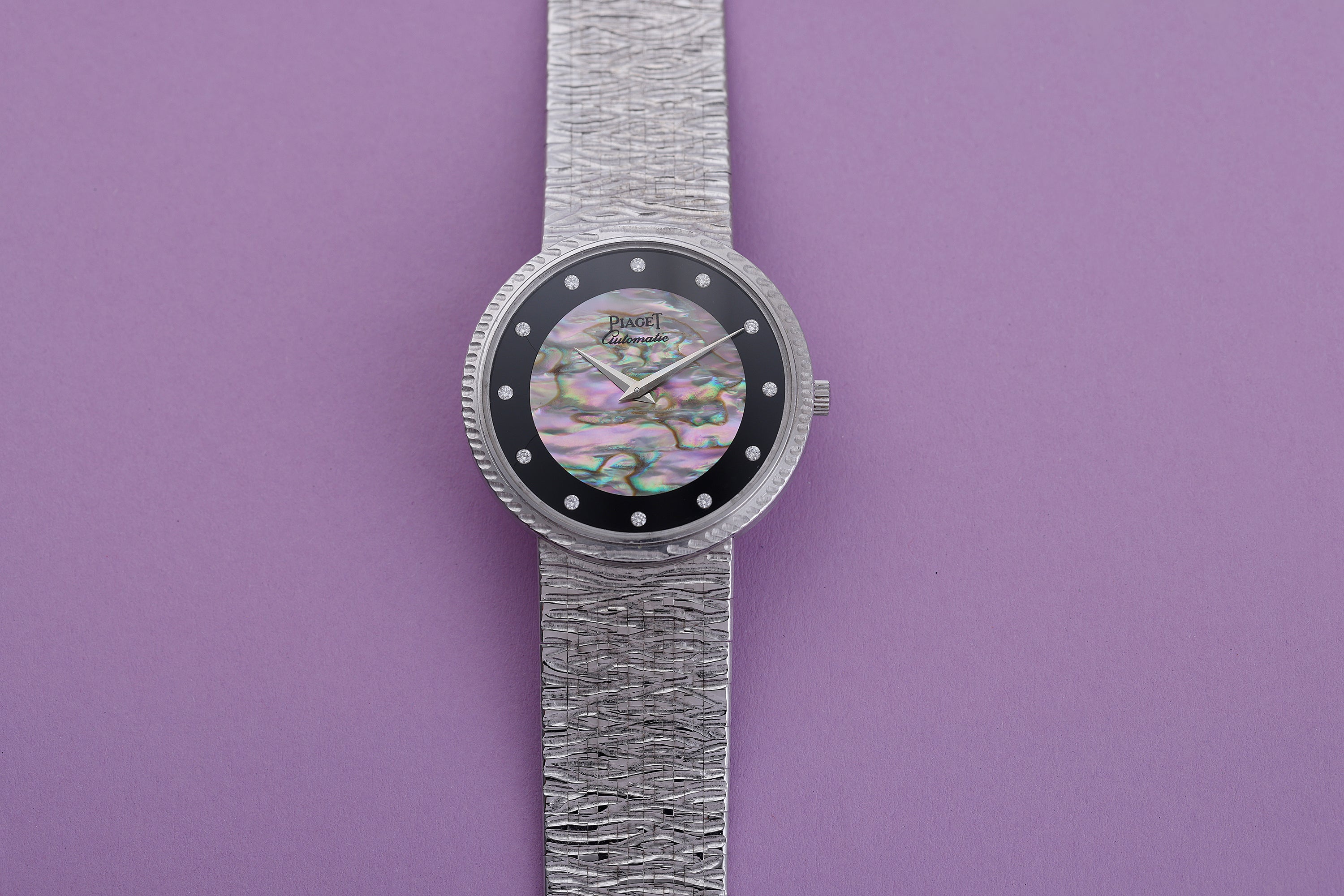 Piaget 1970's wristwatch | REF. 12343 A 19 | Onyx & White Mother of Pearl Diamond Dial | 34mm | 18k White Gold | Automatic | Box