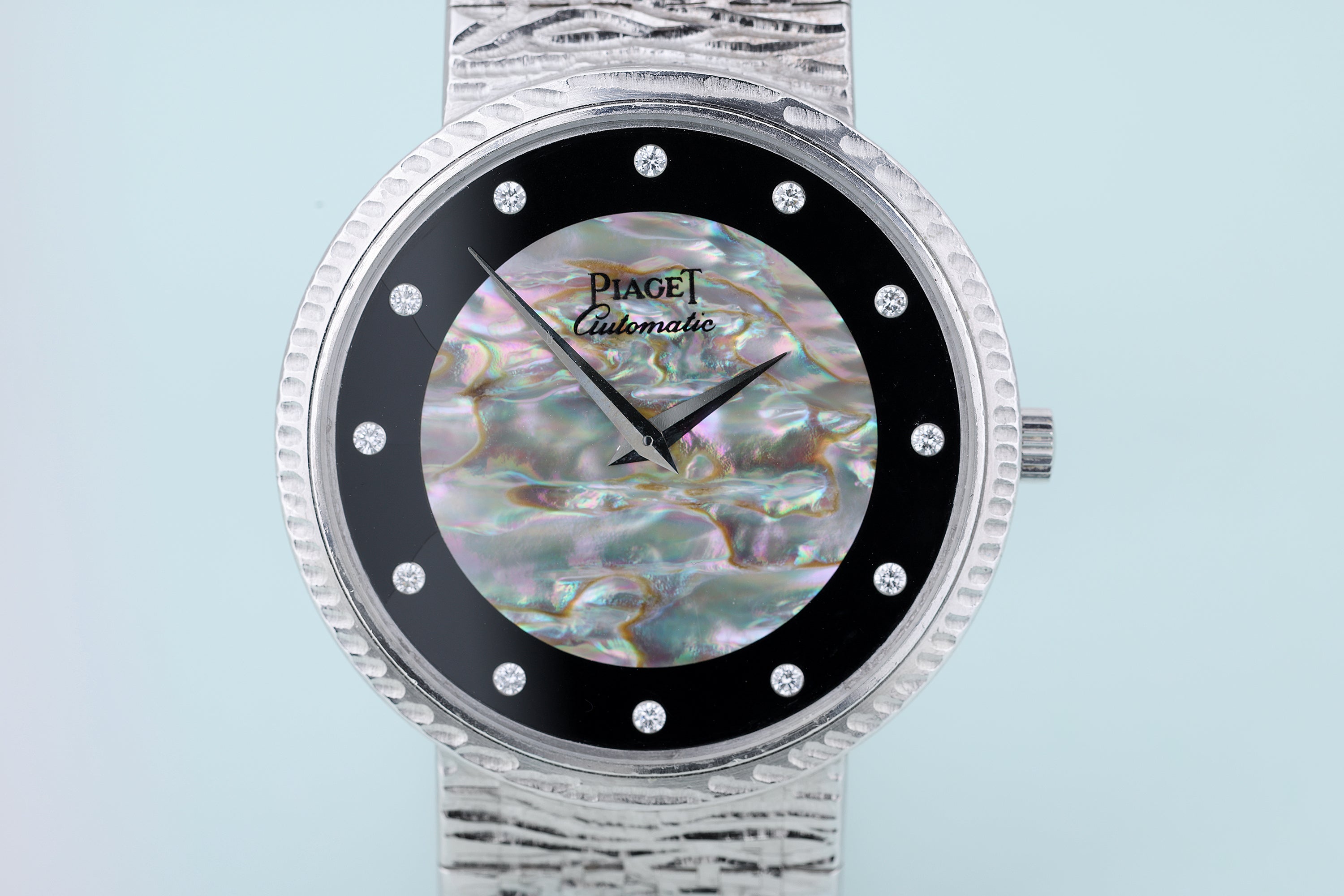 Piaget 1970's wristwatch | REF. 12343 A 19 | Onyx & White Mother of Pearl Diamond Dial | 34mm | 18k White Gold | Automatic | Box