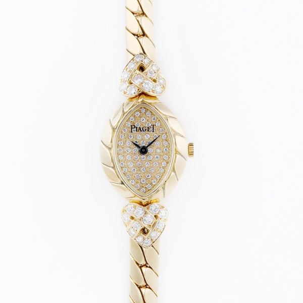 Piaget Vintage Ladies Diamond Wristwatch | REF. 49250 V 102 | Pave Diamond Dial | Oval-Shaped Case | 18k Yellow Gold | 1980's