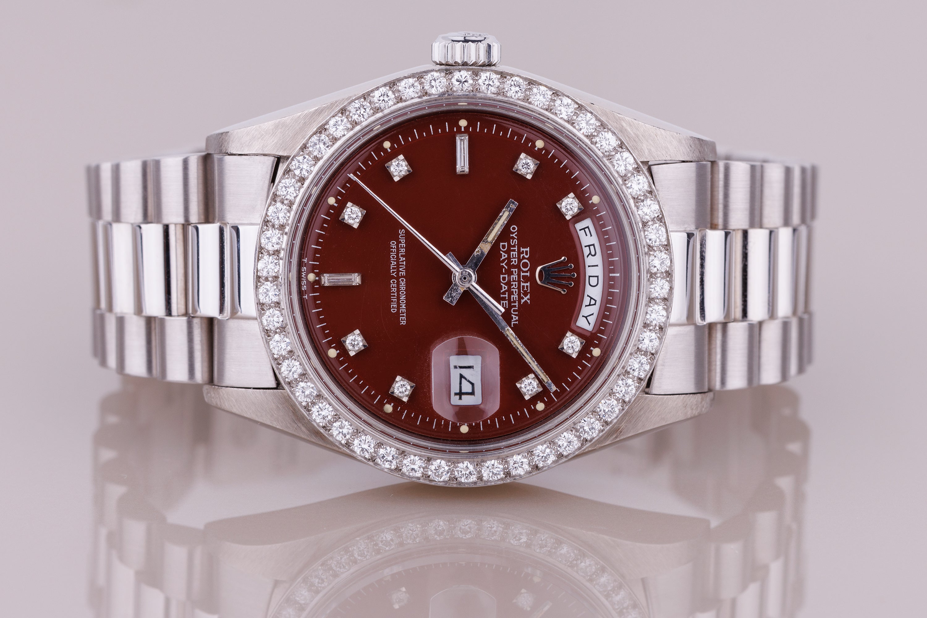 Ultra-Rare Left-Handed Rolex Day-Date | REF. 1804 | Oxblood Red 'Stella' Dial | Diamond Hours & Bezel | 18k White Gold | 1978