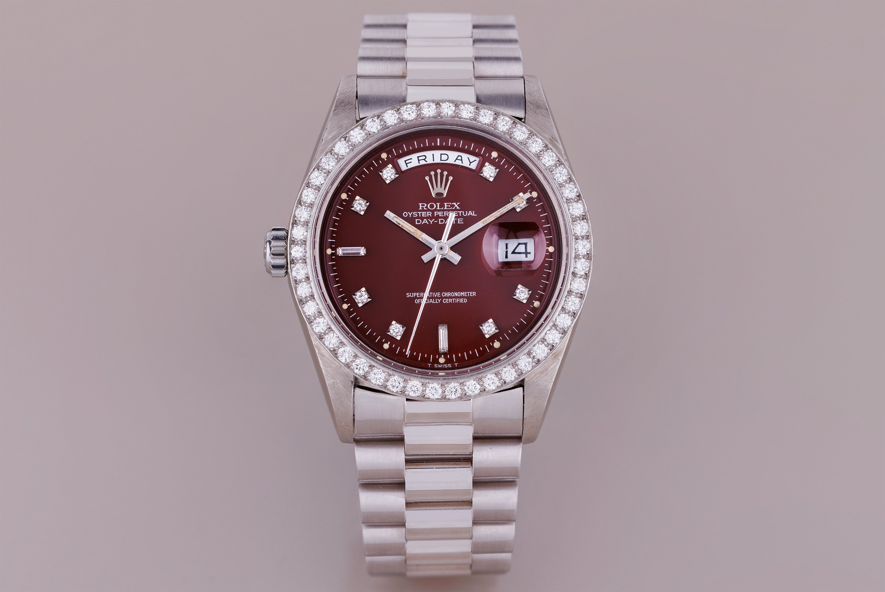 Ultra-Rare Left-Handed Rolex Day-Date | REF. 1804 | Oxblood Red 'Stella' Dial | Diamond Hours & Bezel | 18k White Gold | 1978