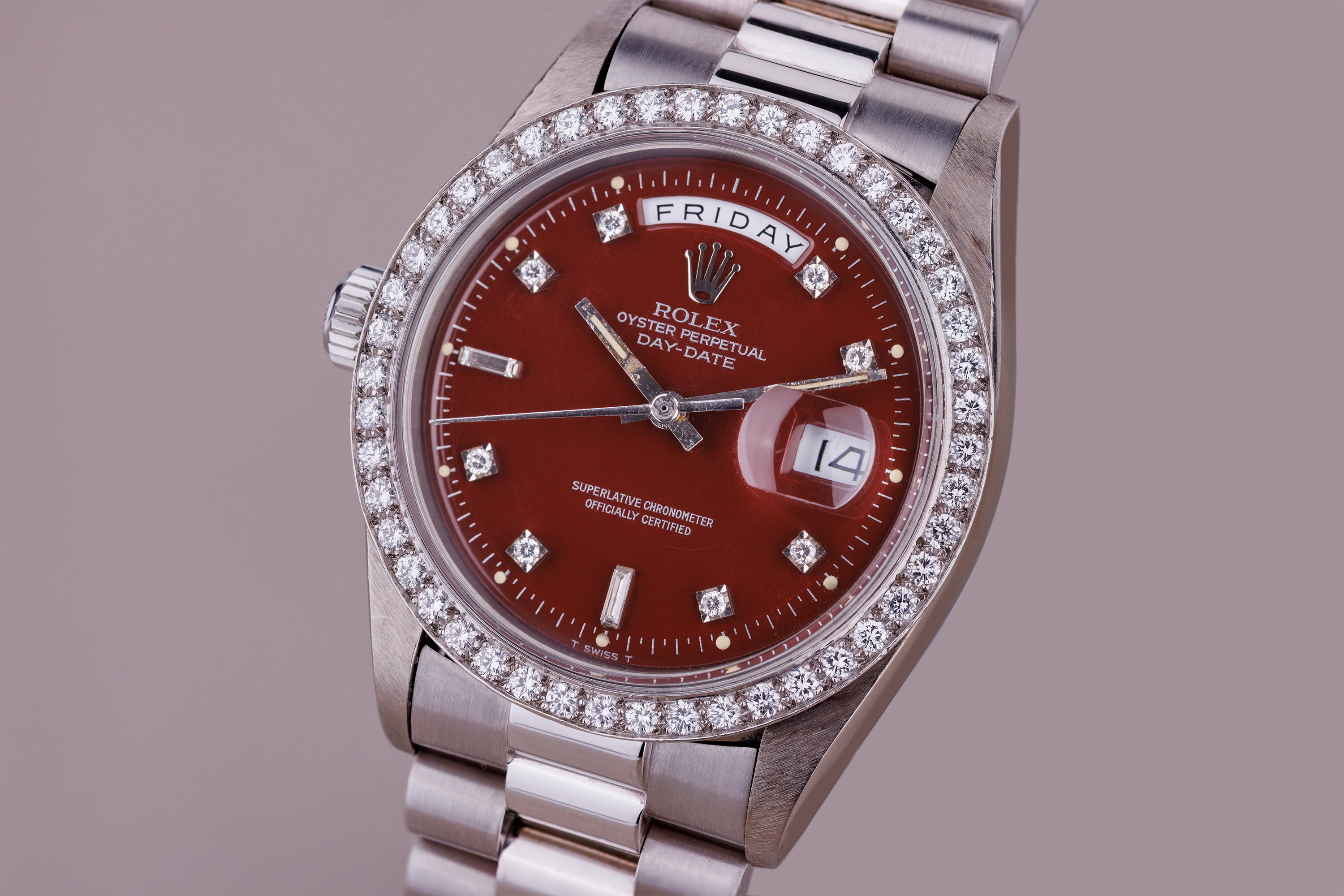 Ultra-Rare Left-Handed Rolex Day-Date | REF. 1804 | Oxblood Red 'Stella' Dial | Diamond Hours & Bezel | 18k White Gold | 1978