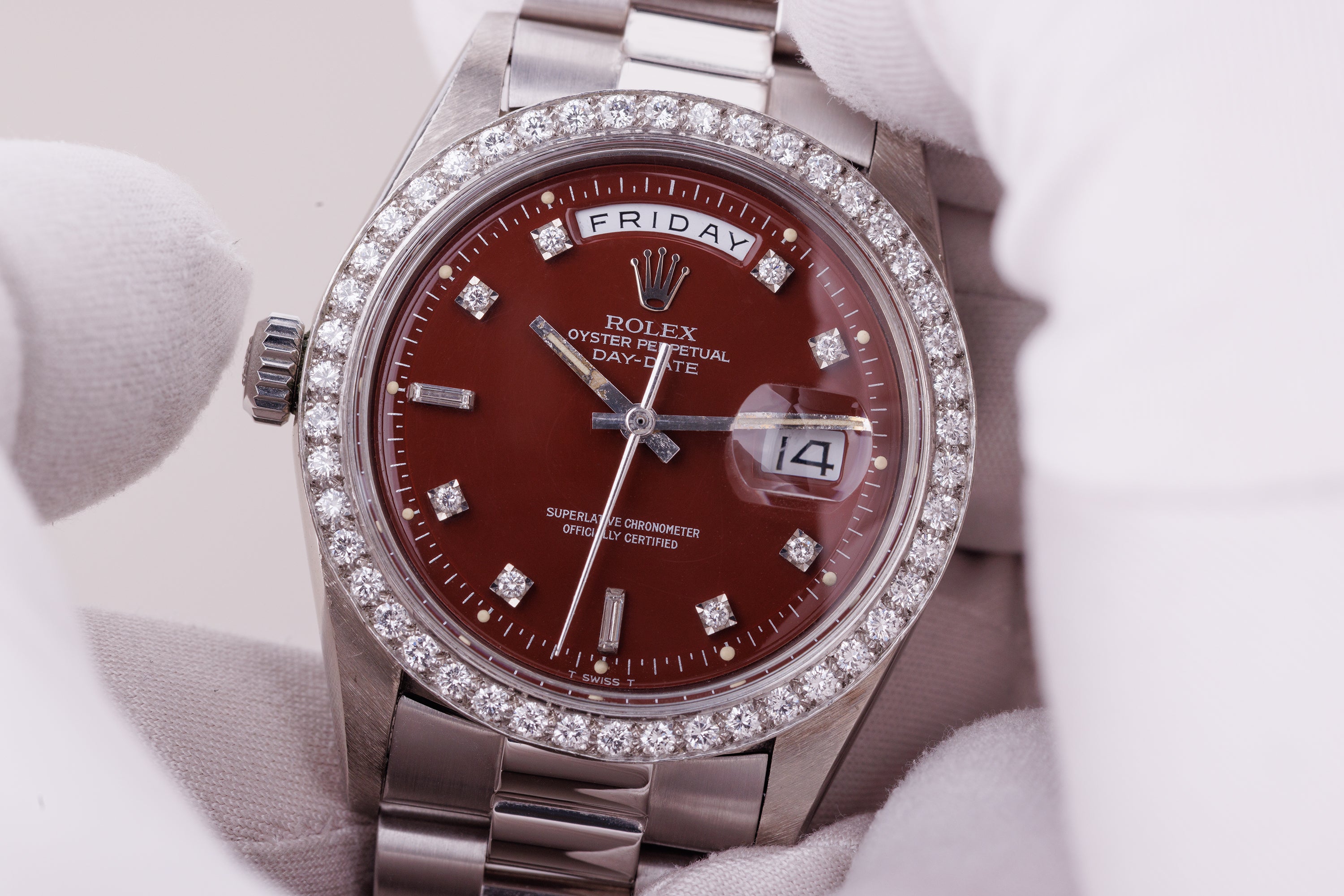 Ultra-Rare Left-Handed Rolex Day-Date | REF. 1804 | Oxblood Red 'Stella' Dial | Diamond Hours & Bezel | 18k White Gold | 1978