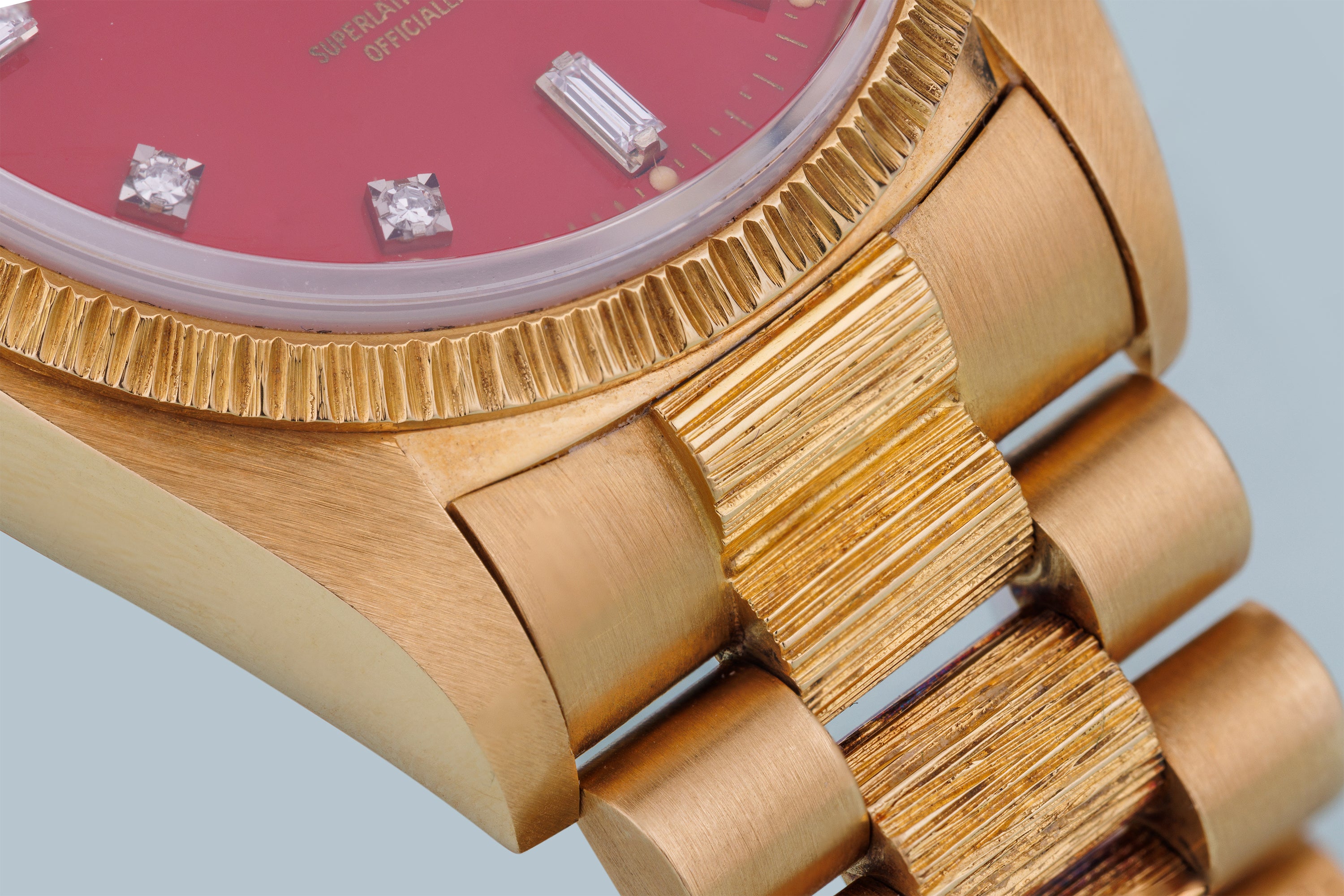 Rolex Day-Date | REF. 18078 | Cherry Red 'Stella' Diamond Dial | Bark Finish | 18k Yellow Gold | 1979