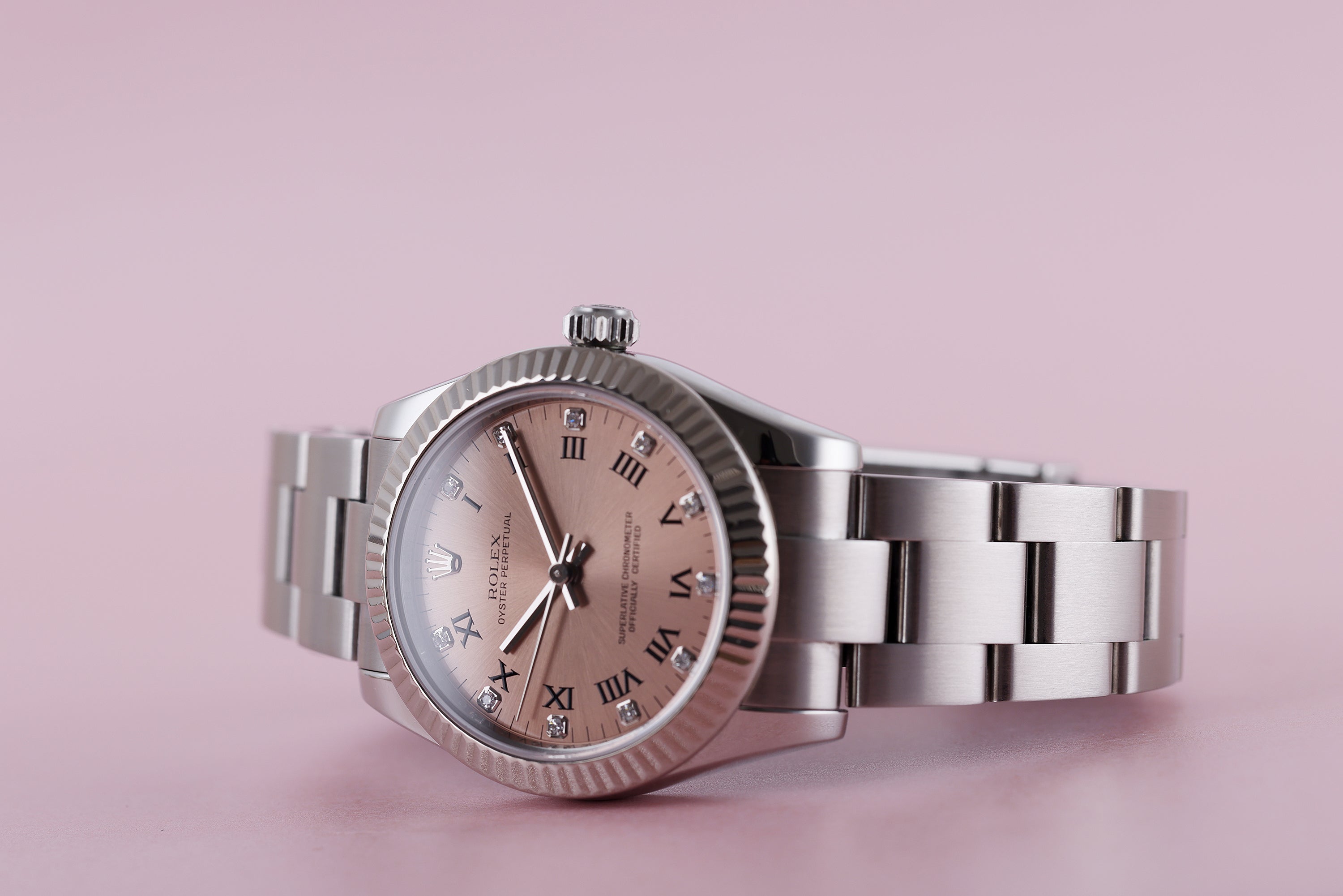 Rolex Oyster Perpetual 31 | REF. 177234 | Salmon Dial | Roman Numerals & Diamond Hour | Stainless Steel & 18k White Gold Bezel | Box & Papers | 2007