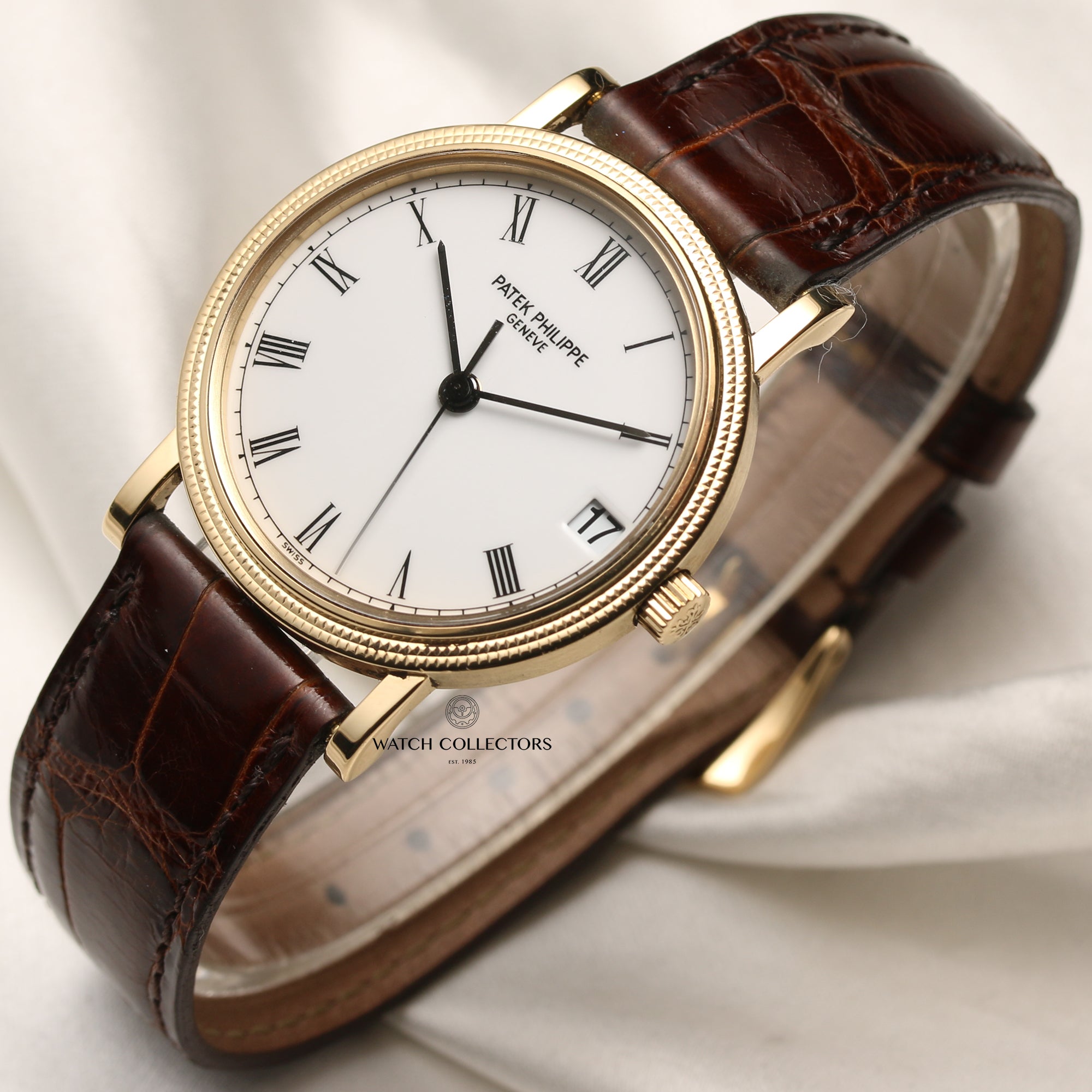 PATEK PHILIPPE, CALATRAVA DOUBLE-SIGNED TIFFANY & CO, REF 3802/205J,  YELLOW GOLD BRACELET WATCH WITH DATE AND RETAILER SIGNATURE, CIRCA 2000, Important Watches, 2020