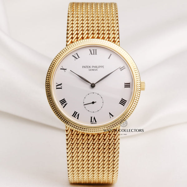 Patek-Philippe-Calatrava-3919-005-18K-Yellow-Gold-Second-Hand-Watch-Collectors-1