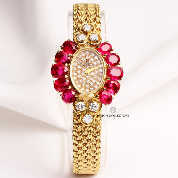montre_royale_lady_18k_yellow_gold_diamond_dial_ruby_bezel_second_hand_watch_collectors_1_1_
