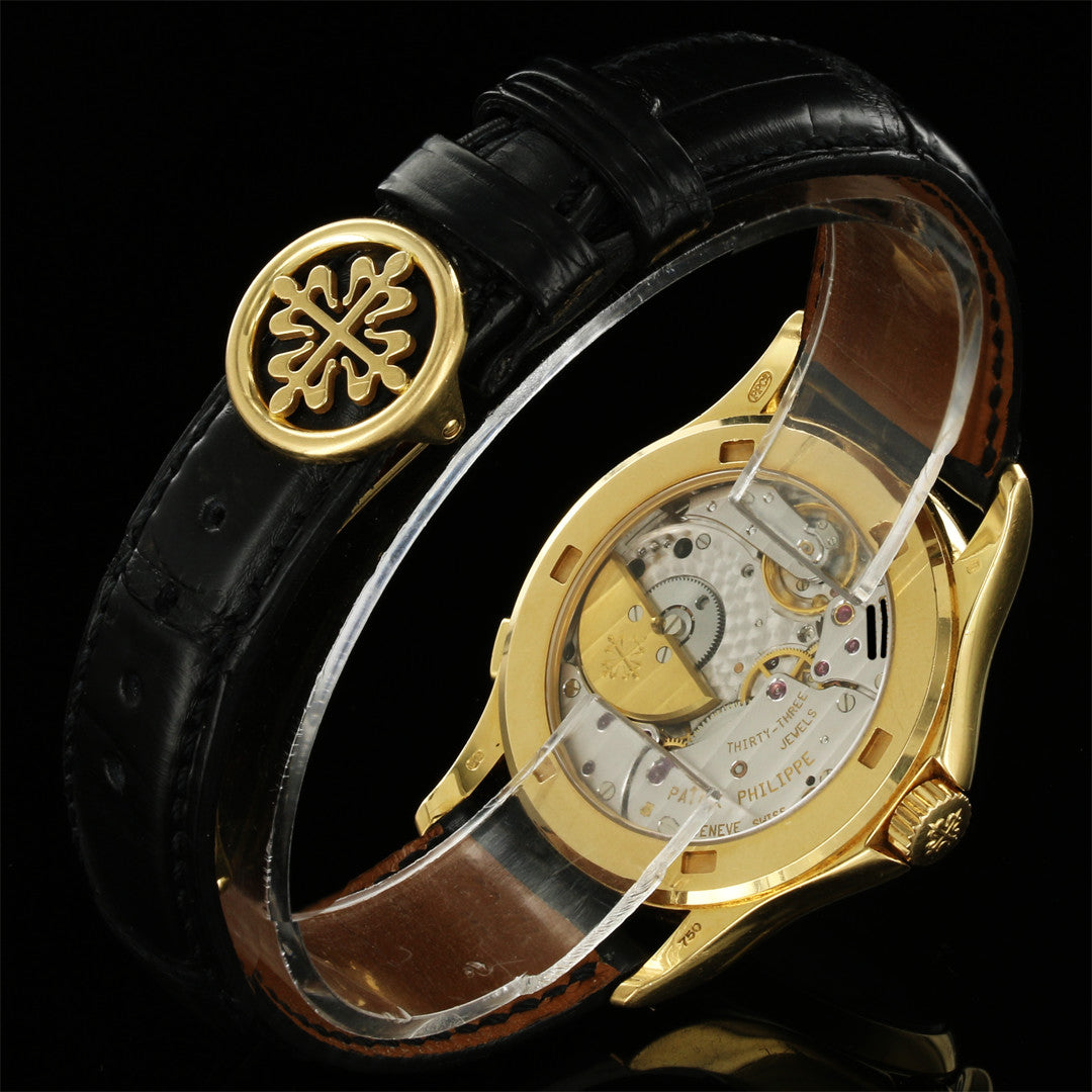 patek_philippe_world_time_5110j_18k_yellow_gold_second_hand_watch_collectors_3__1.jpg