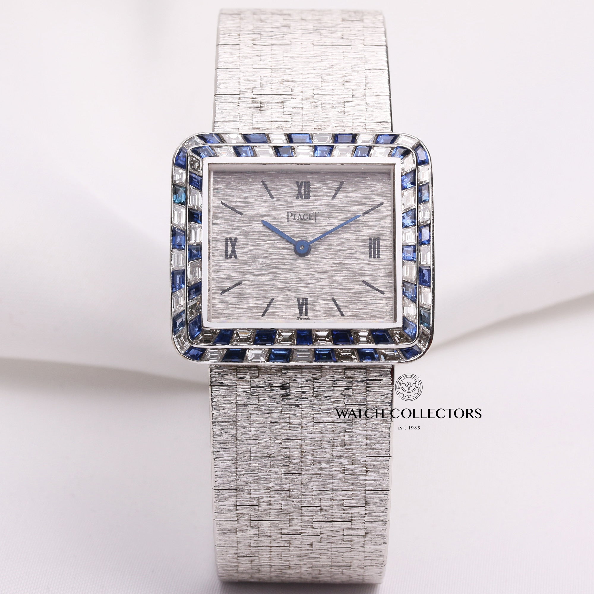 piaget_18k_white_gold_diamond_sapphire_bezel_9366a6_second_hand_watch_collectors_1