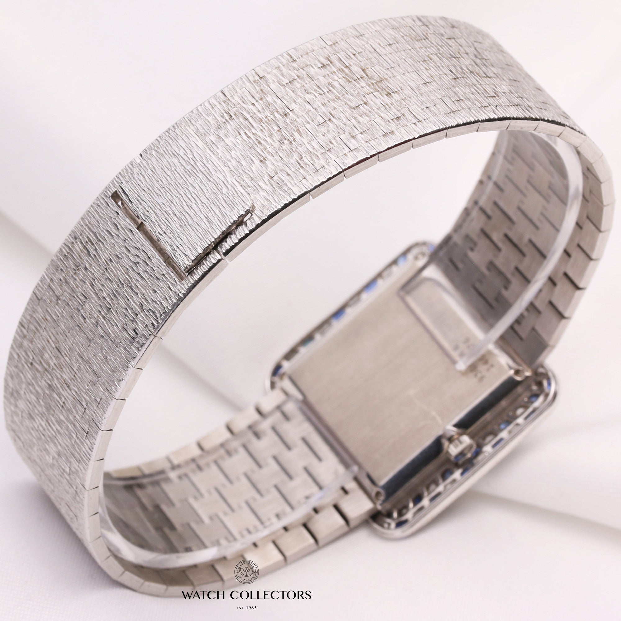 piaget_18k_white_gold_diamond_sapphire_bezel_9366a6_second_hand_watch_collectors_5