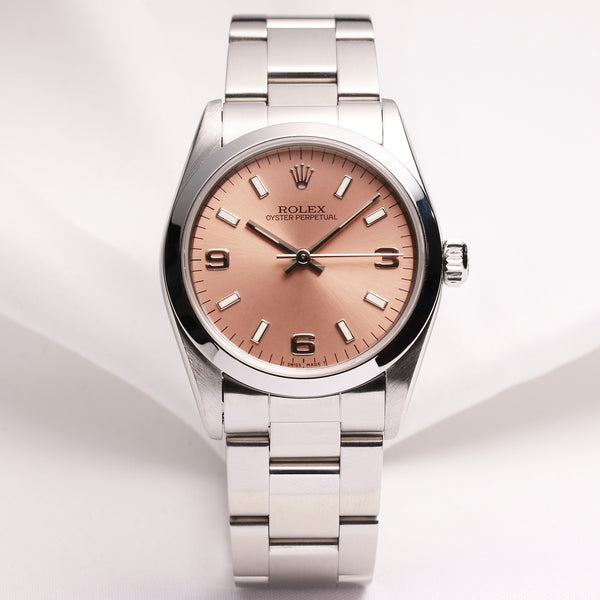 rolex_midsize_oyster_perpetual_67480_stainless_steel_second_hand_watch_collectors_1.jpg