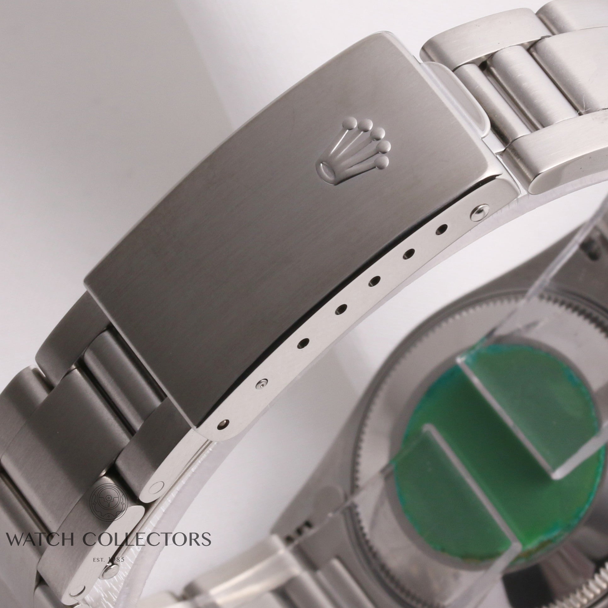 rolex_midsize_oyster_perpetual_black_dial_77080_stainless_steel_second_hand_watch_collectors_6
